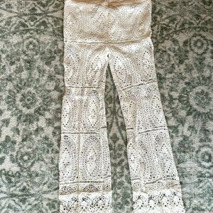 Eyelet pants. Shorts on top, can wear over bathing suit or as pants